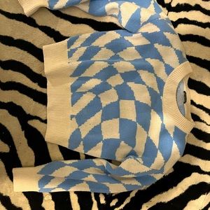 Tripped checkered sweater